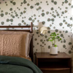 Bedroom with Close-up of green floral wallpaper